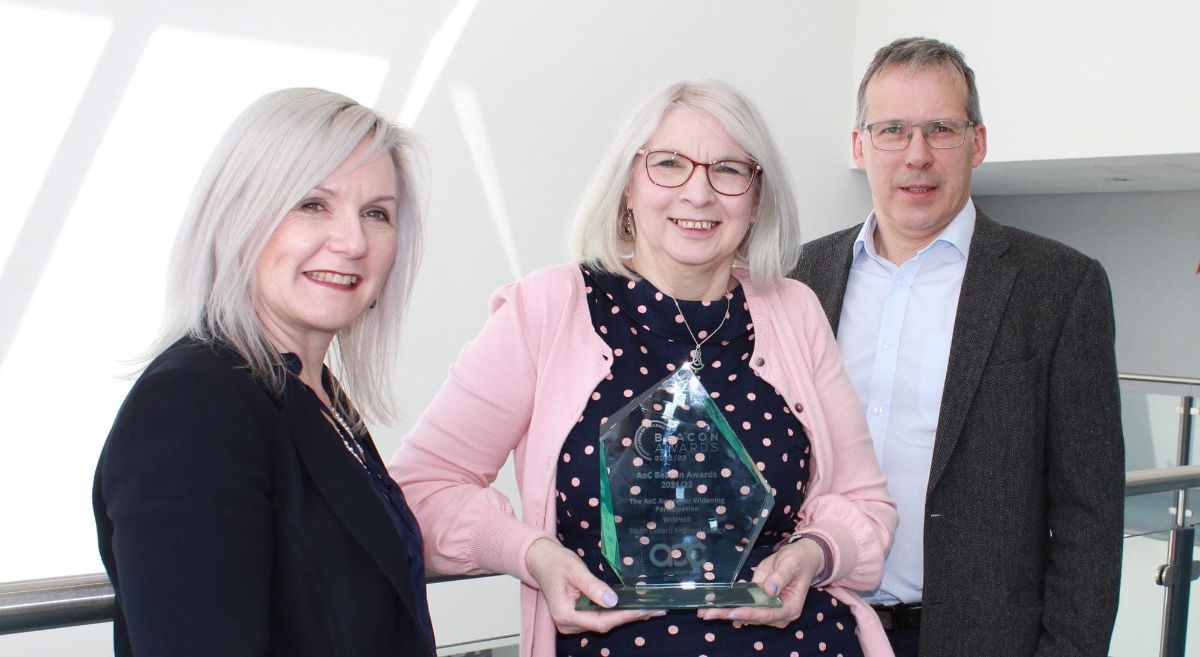 Heather McKee, Ellie Bradley and Paul Walsh with Beacon Award for Widening Participation